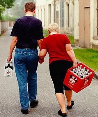 woman_carrying_mans_beer.jpg